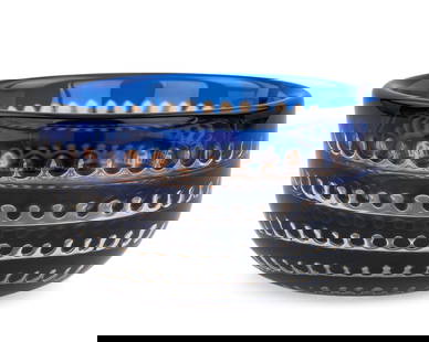 Edvin Ohrstrom Orrefors Ariel Art Glass Bowl: Edvin Ohrstrom for Orrefors Swedish cased art glass bowl having blue and amber wave motif, signed on base "ORREFORS Ariel Nr. 324-E9 Edvin Ohrstrom" original label present, overall good condition 4" -