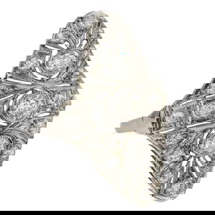 Art Deco Platinum & Diamond Ring: Fine early 20th c platinum cocktail ring set with 3 center approx. .13 ct rd cut European diamonds and 18 surrounding round cut diamonds .02 to .03 cts each. Approx. .8 CTS.T.W. Ring size 7.