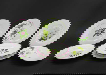 8 LeChambrelain Limoges Floral Plates and Bowls: 8 LeChambrelain Limoges porcelain soup bowls and dinner plates having fine hand painted decoration with each piece depicting a different botanical species, inscribed on reverse "hand painted for Franc