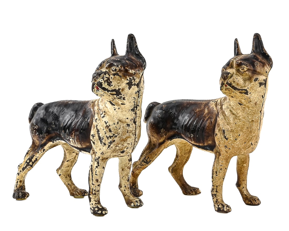 Boston Terrier Cast Iron doorstops (Pair): Pair of cast iron doorstops depicting standing Boston Terriers. Retain painted surfaces with age-appropriate wear. Each measures approx. 10" H x 9" W.