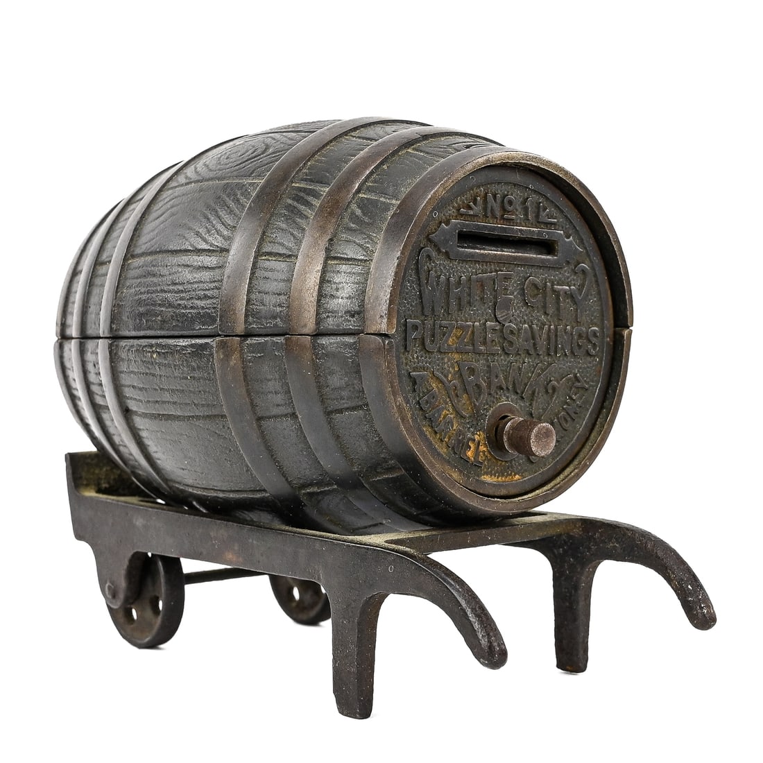 White City Puzzle Savings Bank “A Barrel of Money: No. 1 White City Puzzle Savings Bank in the form of a barrel, inscribed “A Barrel of Money.” Approx. 4" x 3".