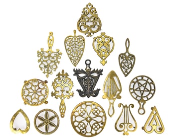 Group of 15 Polished Brass Trivets and Pot Stands