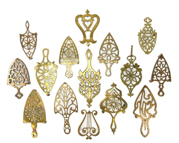 Group of 15 Polished Brass Trivets