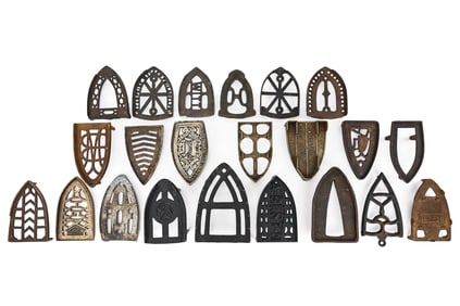 Group of 22 Cast Iron Spade Trivets