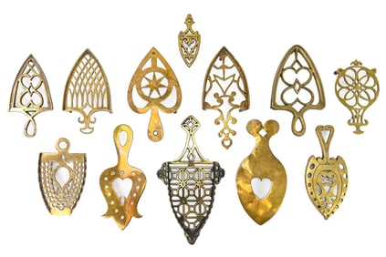 Group of 12 Brass Trivets