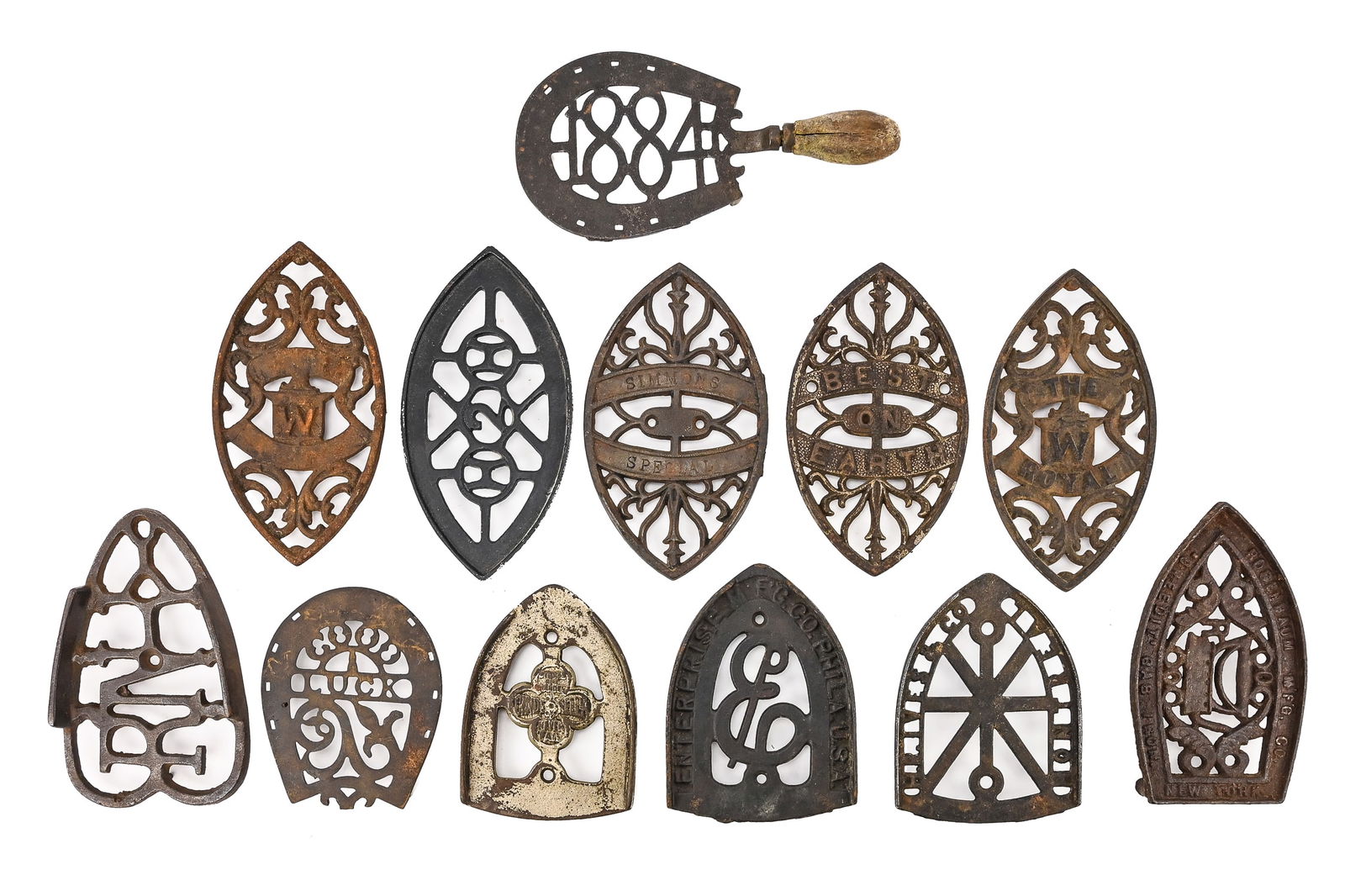 12 Branded Cast Iron Trivets: 12 Branded Cast Iron Trivets