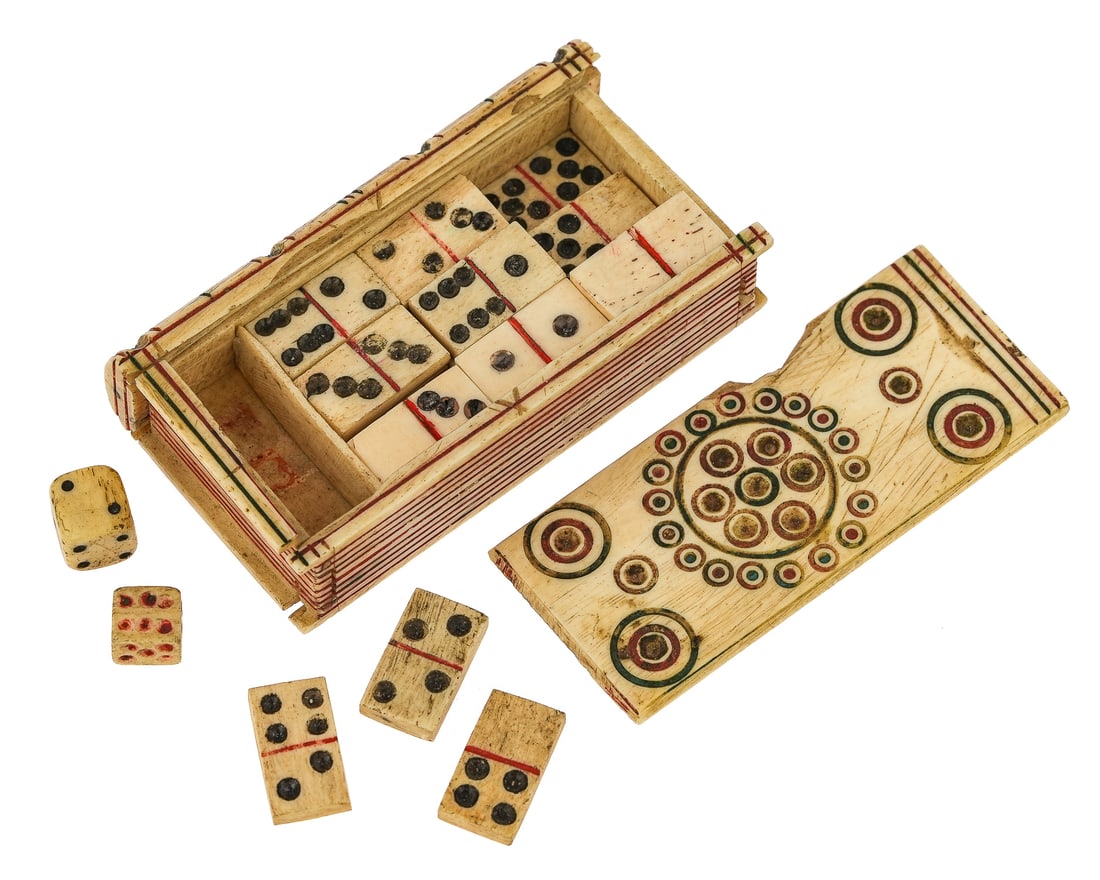 Ca. 1800 Prisoner of War Carved Bone Book Box & Dice: Prisoner of War Carved Bone and Inlaid Box, circa 1800, Napoleonic era, in the form of a book with carved spine and pages, slide top on one side and with painted & carved decoration. Interior with 28