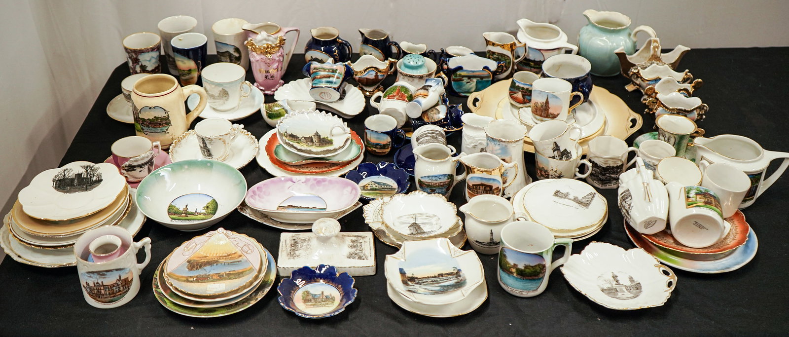 Large lot of 19th c. US Townview Souvenir China: Large lot of 19th c. German imported porcelain souvenir china featuring transfer decoration of US town views including Vermont, New Hampshire, Massachusetts, Canada etc, in a variety of forms includin