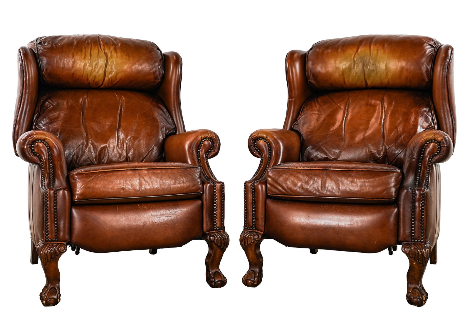 Pair of Latitudes Leather Reclining Wing Chairs: Pair of Latitudes reclining leather wing chairs in a rich tobacco sunburst leather (The color these are from a non-smoking home) with carved ball and claw Chippendale feet - 40 x 30 x 34"