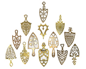 Group of 13 Polished Brass Trivets