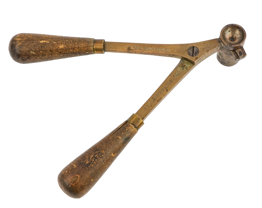 Rare Brockway Bellows Falls, VT Bullet Mold: Rare bronze single bullet mold marked N.S. Brockway, Bellows Falls, VT. Norman Brockway (1868-1936) a Vermont gunsmith best known for his high quality target rifles. 7" long. 40 cal.