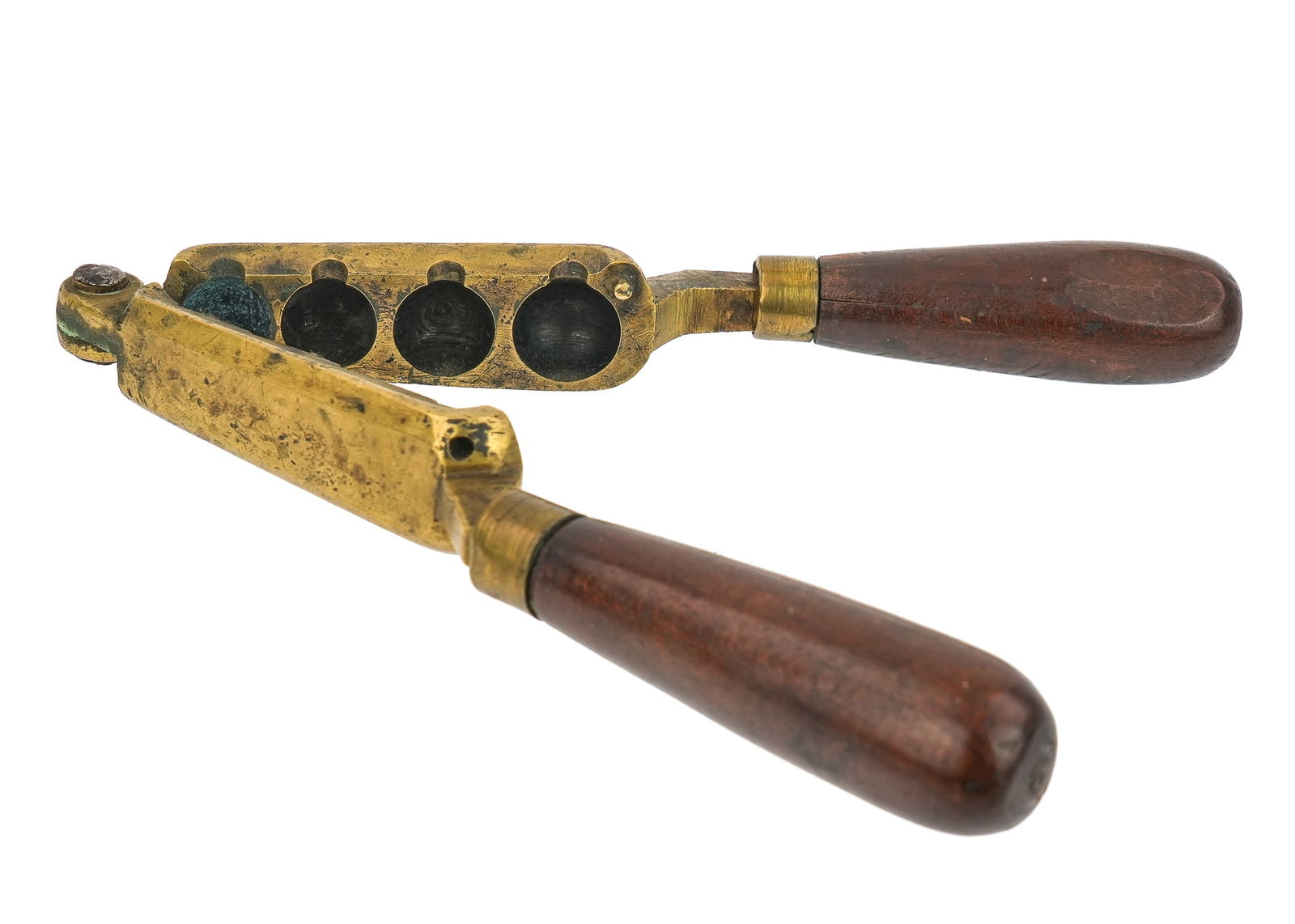 18th Brass Gang Bullet Mold: Revolutionary War era brass 4 ball gang bullet mold. 7 1/2" long. 70, 65, 63, 58, approx. caliber's for balls. Some wear and digs to brass.