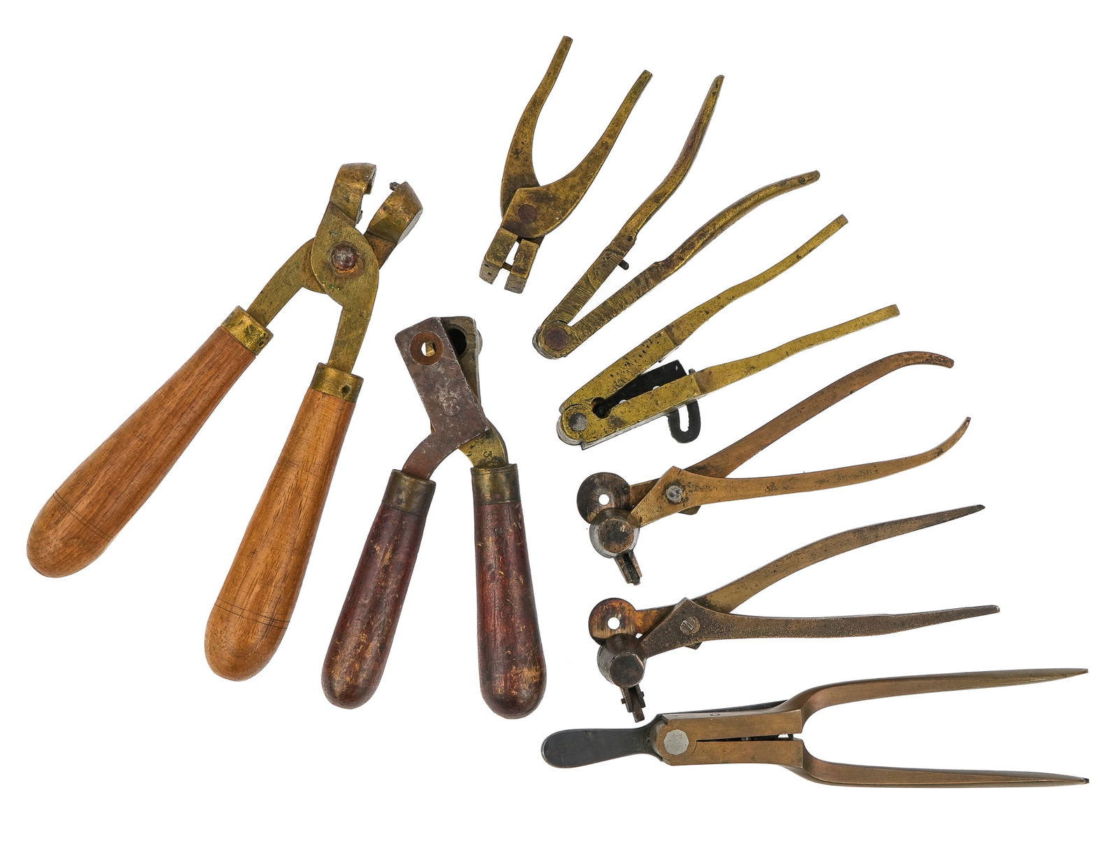 8 Bronze Bullet Molds: A group of 8 various bronze bullet molds. Bronze duel 41 cal. Mold stamped faintly Colt's Patent on right arm. W Tranter's Patent signed mold, and others.