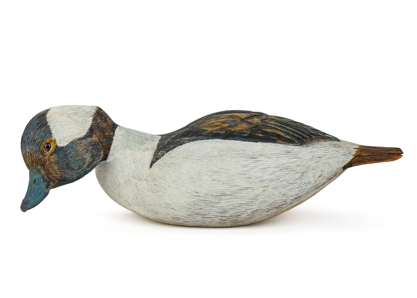 Bufflehead Drake Decoy: Fine detailed carving of a Bufflehead drake decoy, signed on bottom "Bufflehead Drake GC". By William G. Sutter. WG The Carver. Glass eyes, swimming form. 12" long.
