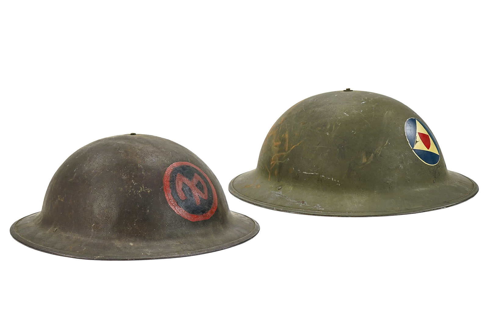 WWI, WWII Doughboy Helmets: WWI 27th Infantry Division M1917 helmet marked ZF 38 on underside of rim with in-field hand painted NYD monogram (Empire Division, NY), sold with a WWII Civil Defence Auxiliary Police helmet