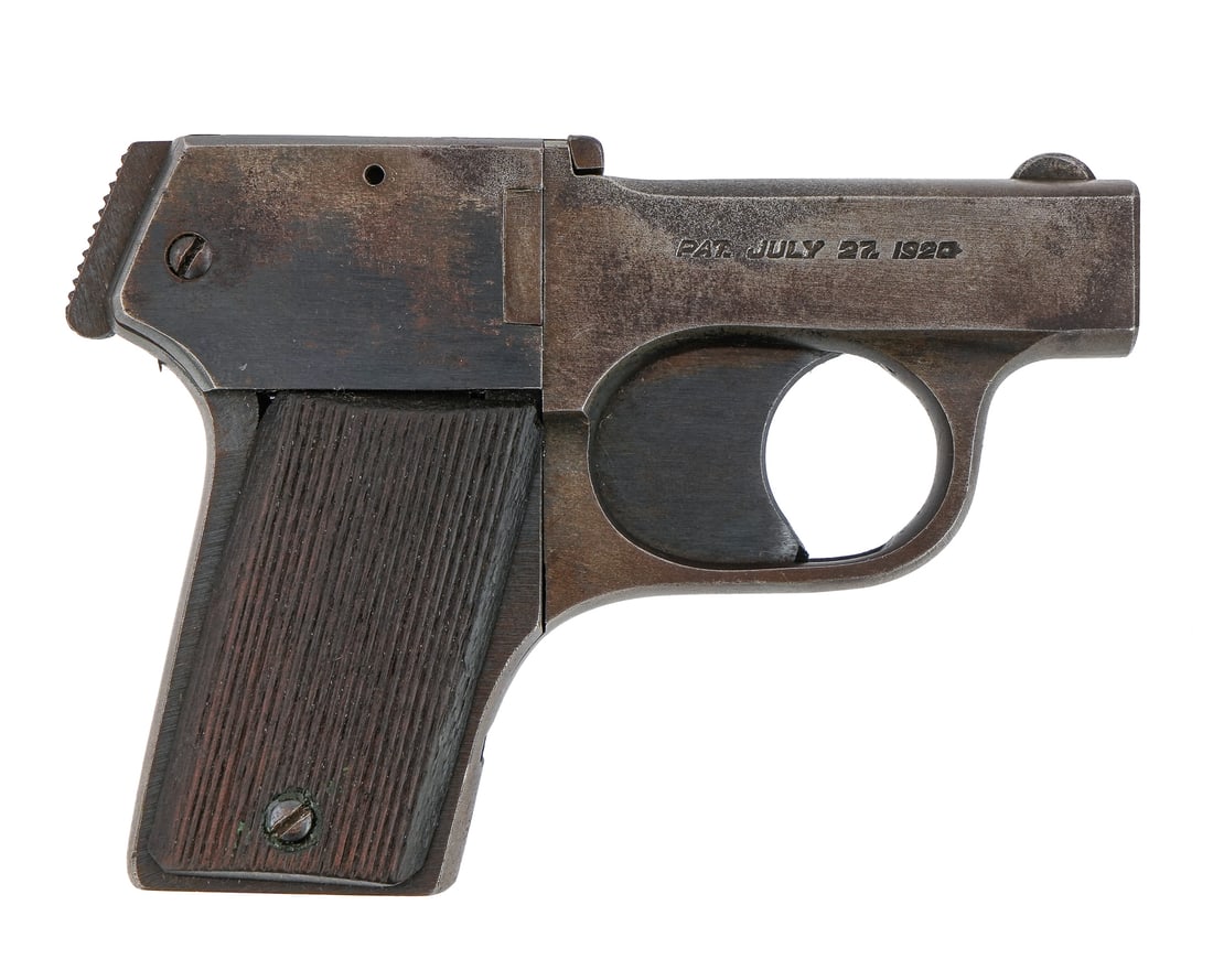 OF Mossberg - Brownie pistol in .22Lr: OF Mossberg - Brownie four barrel pistol in .22lr with interesting revolving hammer mechanism. 2.5" barrel 4.5" overall