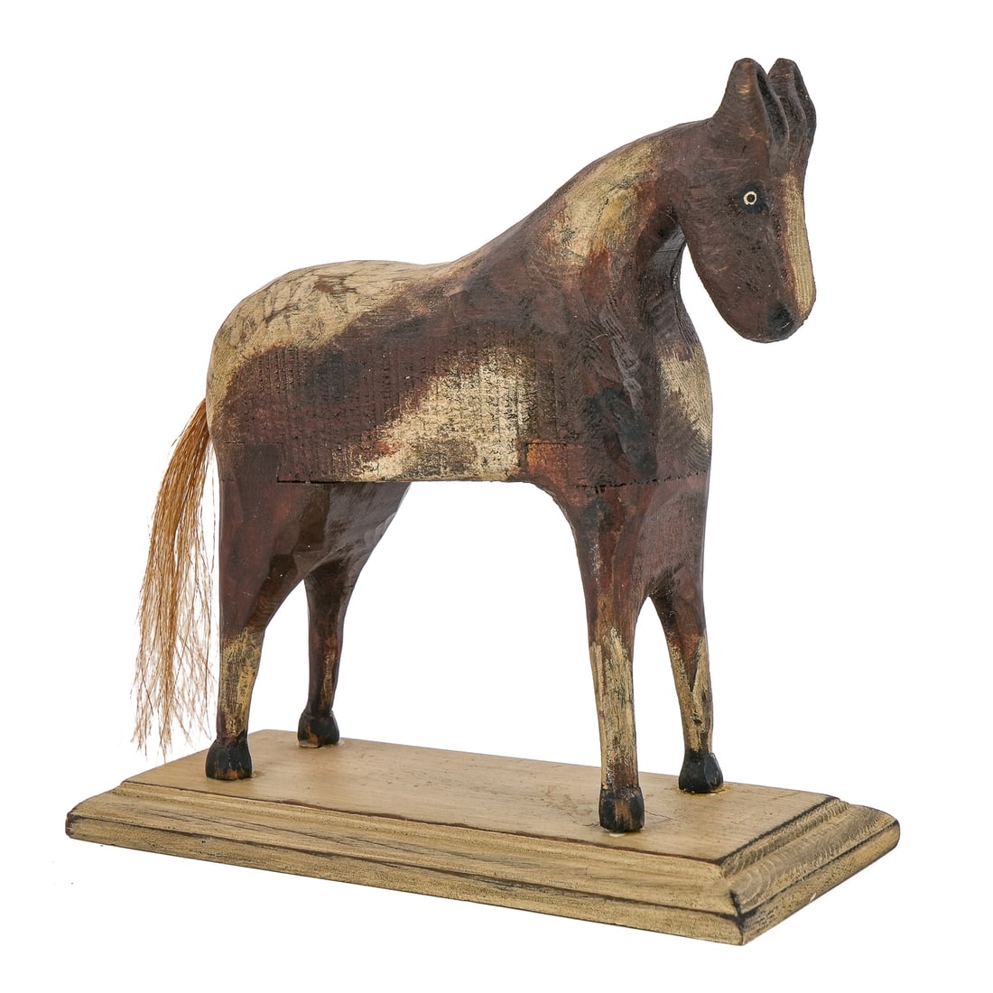 Darkfeather Freedman Carved Horse: Darkfeather Freedman (Blackoot b 1953-) carved and painted wooden pony, signed on base, length 7 1/2", ht 9", stand length 9"