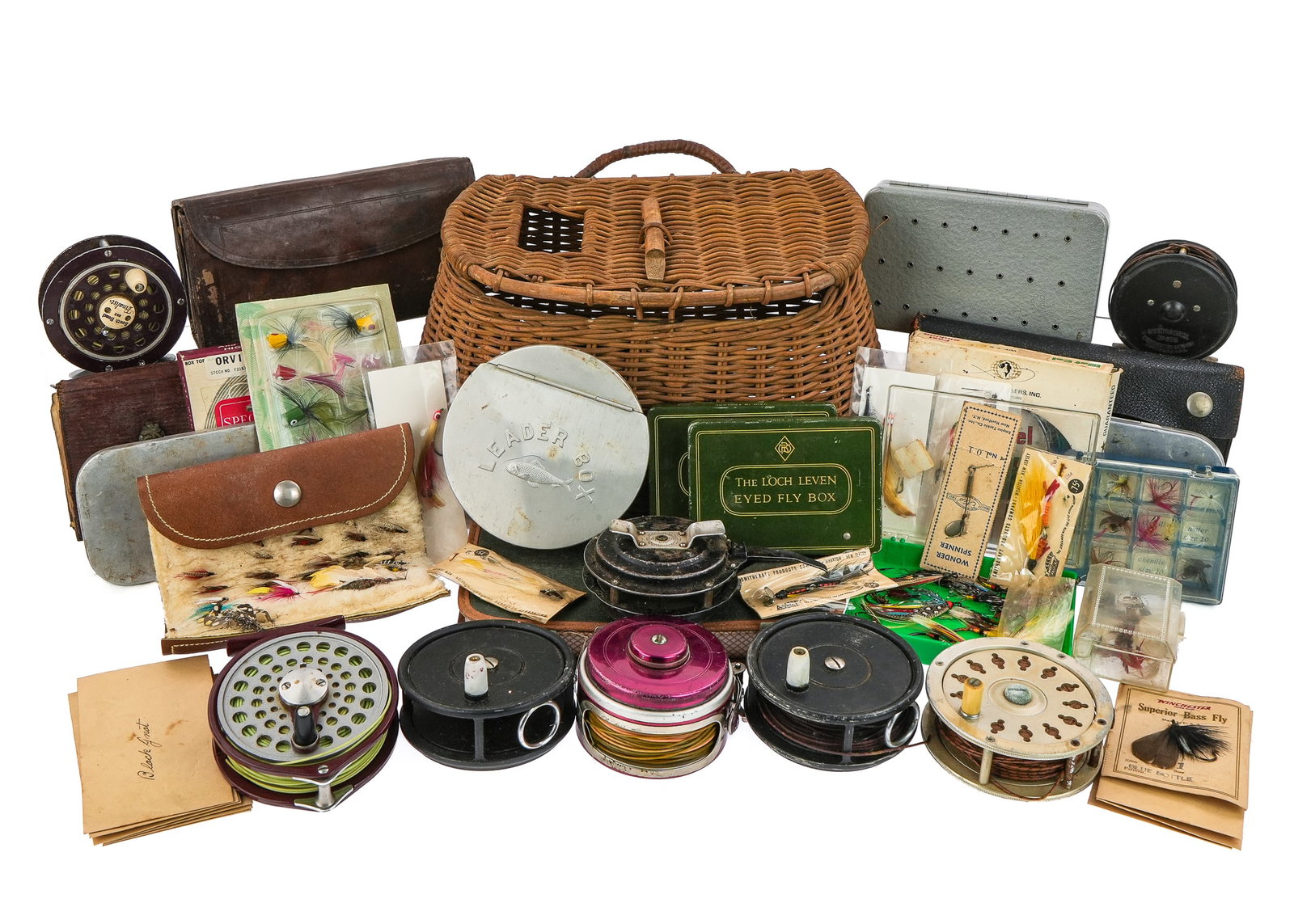 Antique Fly Fishing Items: Group of antique fly fishing items including 8 fly reels, symploreel, 2 automatics, Ocean City 306, LL Bean No. 110. Various early fly boxes and folders including leather & sheepskin, leader folders,