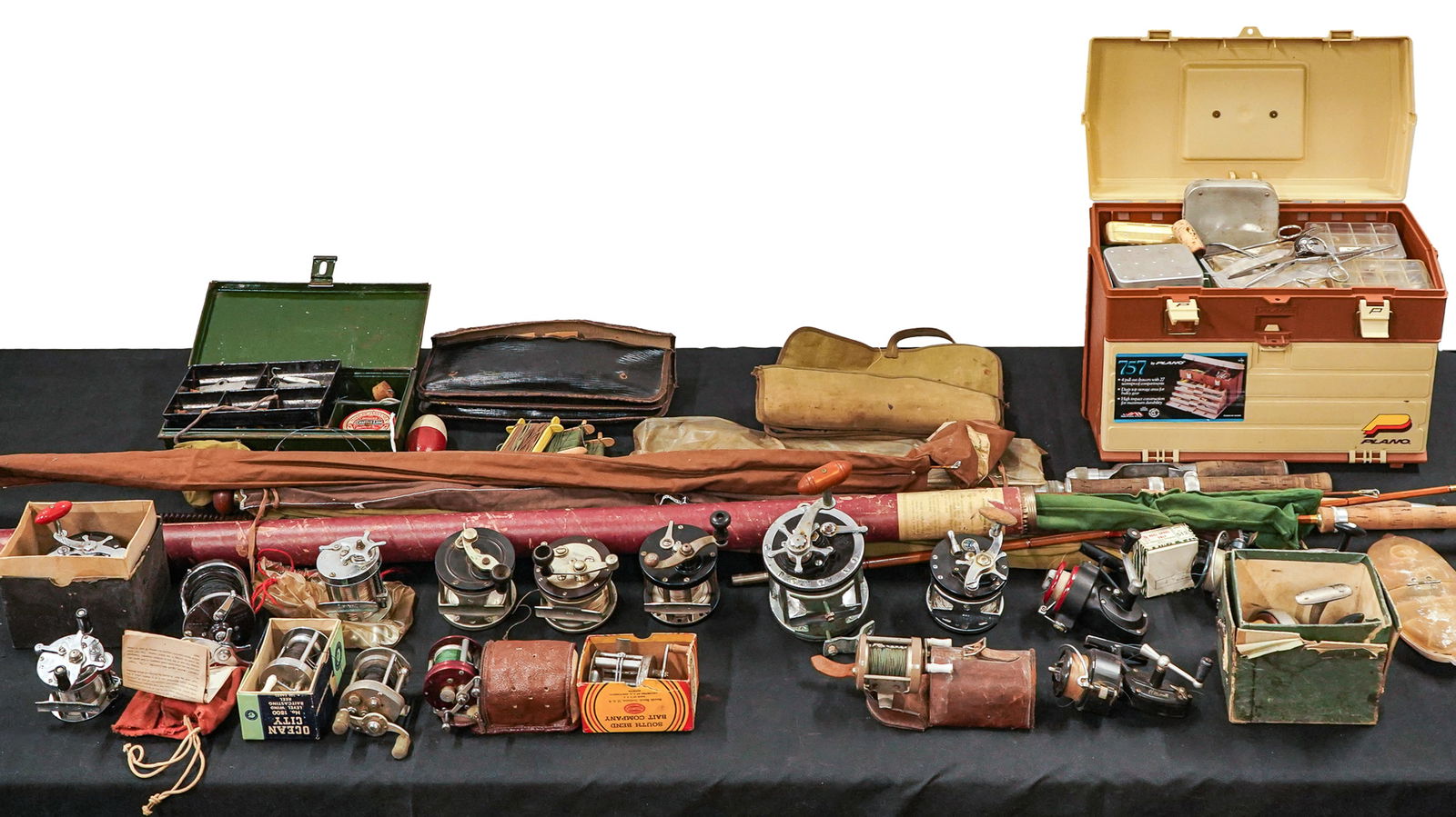 Large Group Vintage Fishing Tackle: A large group of vintage fishing tackle including early deep sea reels, spinning reels Mitchell, Pflueger freespeed 1000, Luxor in original box, True Temper 727/. Bamboo deep sea rods and bamboo spinn