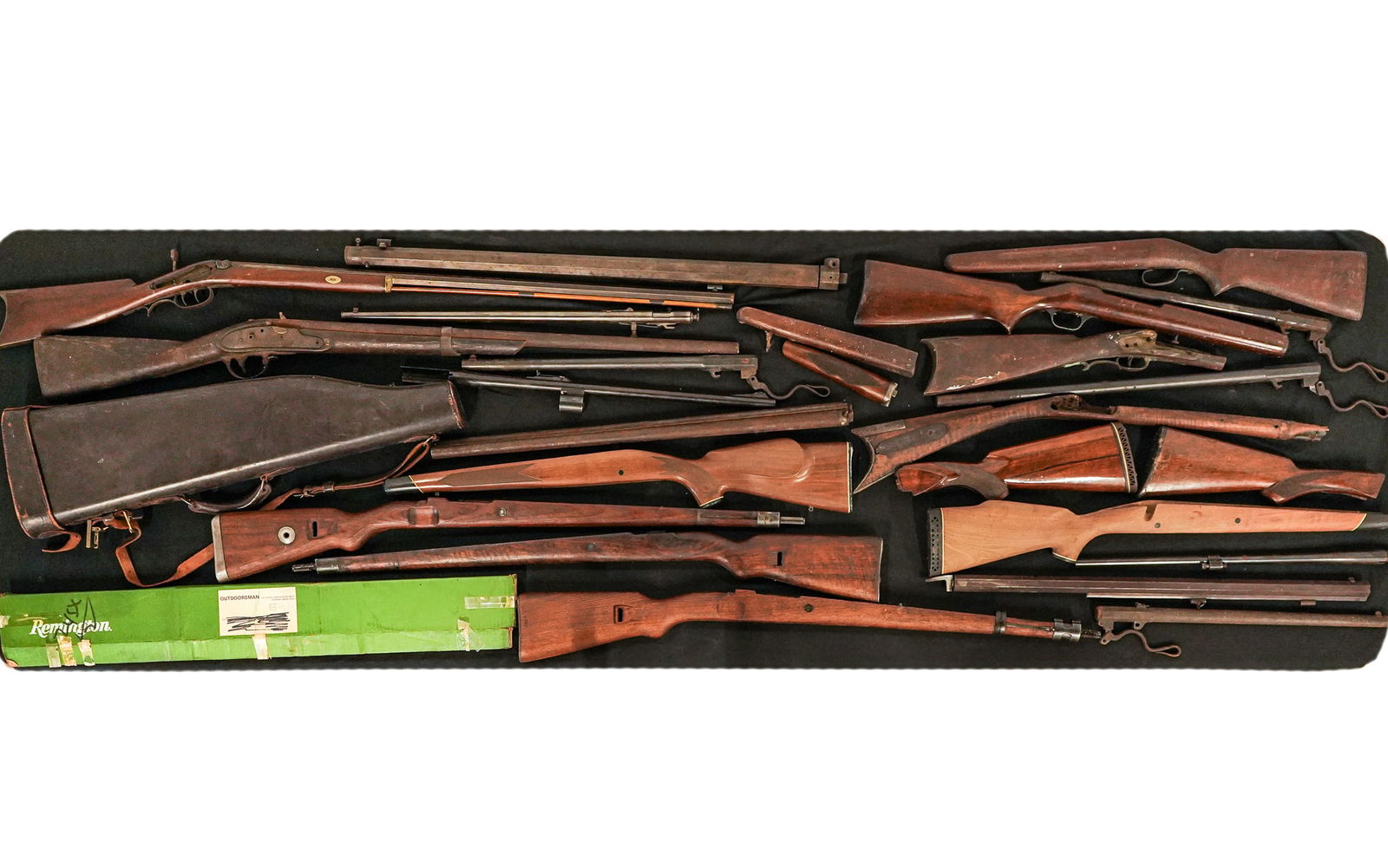 Stocks, Barrels, & Parts: Stocks, Barrels, and parts including a US Blake converted lock. 19th c target rifle missing lock. 19th c Lancaster PA octagon target barrel. Rein New York octagon barrel. Other stocks and barrels.