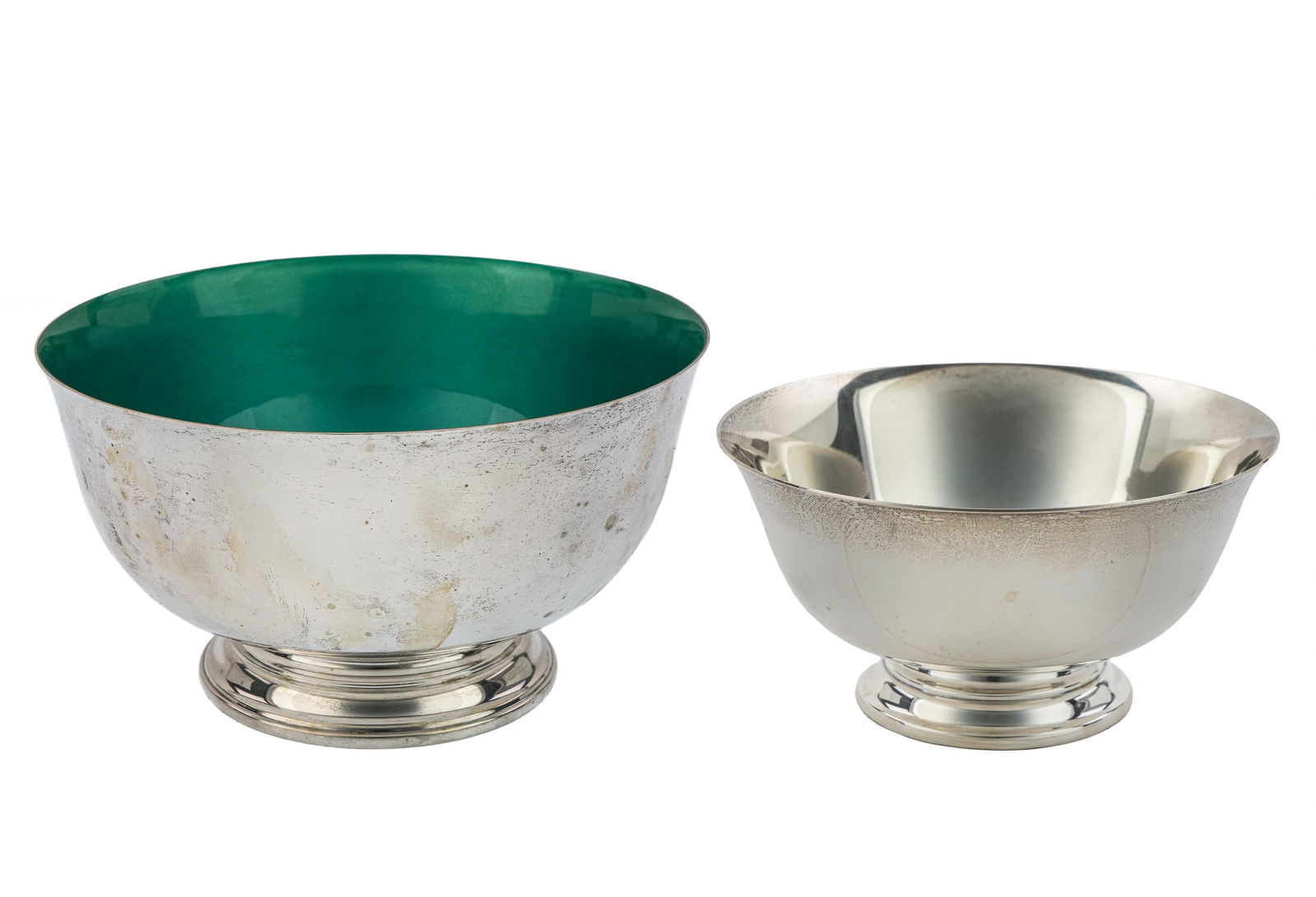 Two Sterling Silver Paul Revere Style Bowls: Two mid 20th c. Paul Revere style reproduction sterling silver footed serving dishes, the larger by Towle with green enameled lining, the smaller by Reed and Barton (small dent to foot), overall good
