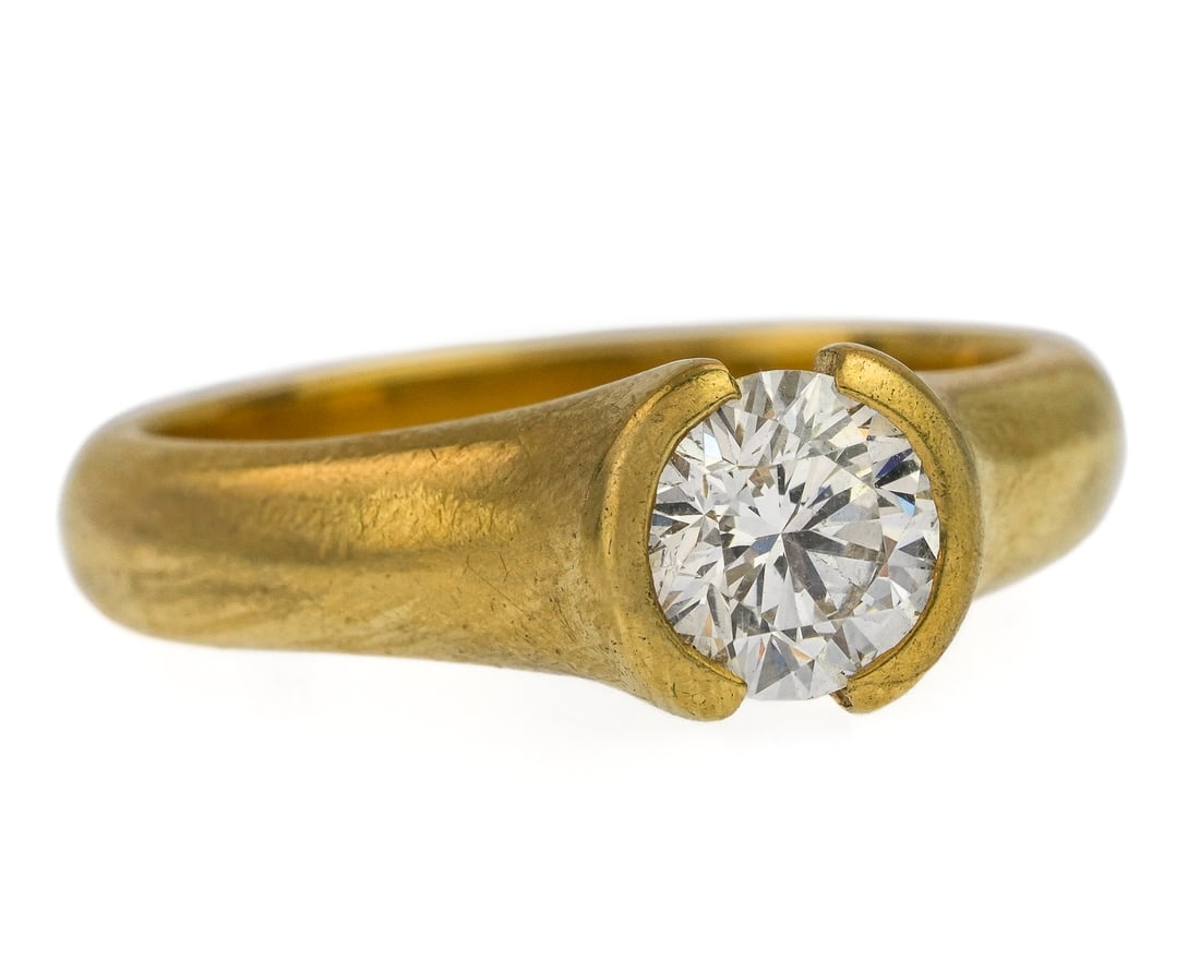 18k 1.2 CT Solitaire Diamond Grannis Gallery Engagement Ring: 18k yellow gold engagement ring with solitaire modern round cut diamond measuring 7.2 mm x 4 mm or 1.2 CT. VVS1, color J-F. Signed Grannis- Grannis Gallery Burlington, Vermont. Ring size 6.5.