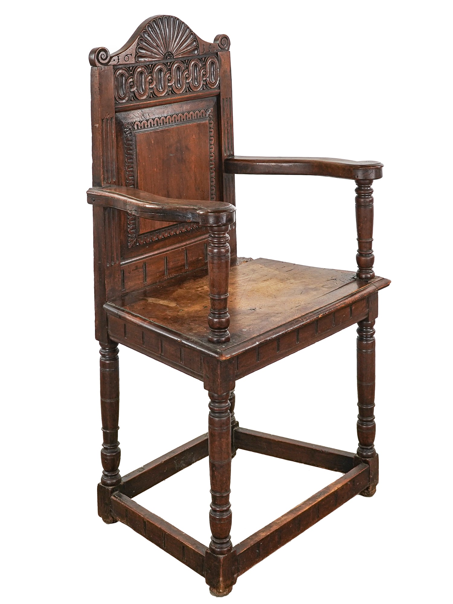18th c Continental Walnut carved chair: 18th c Continental walnut carved armchair. with fan and chain decorated back. 45 x 25 x 17"