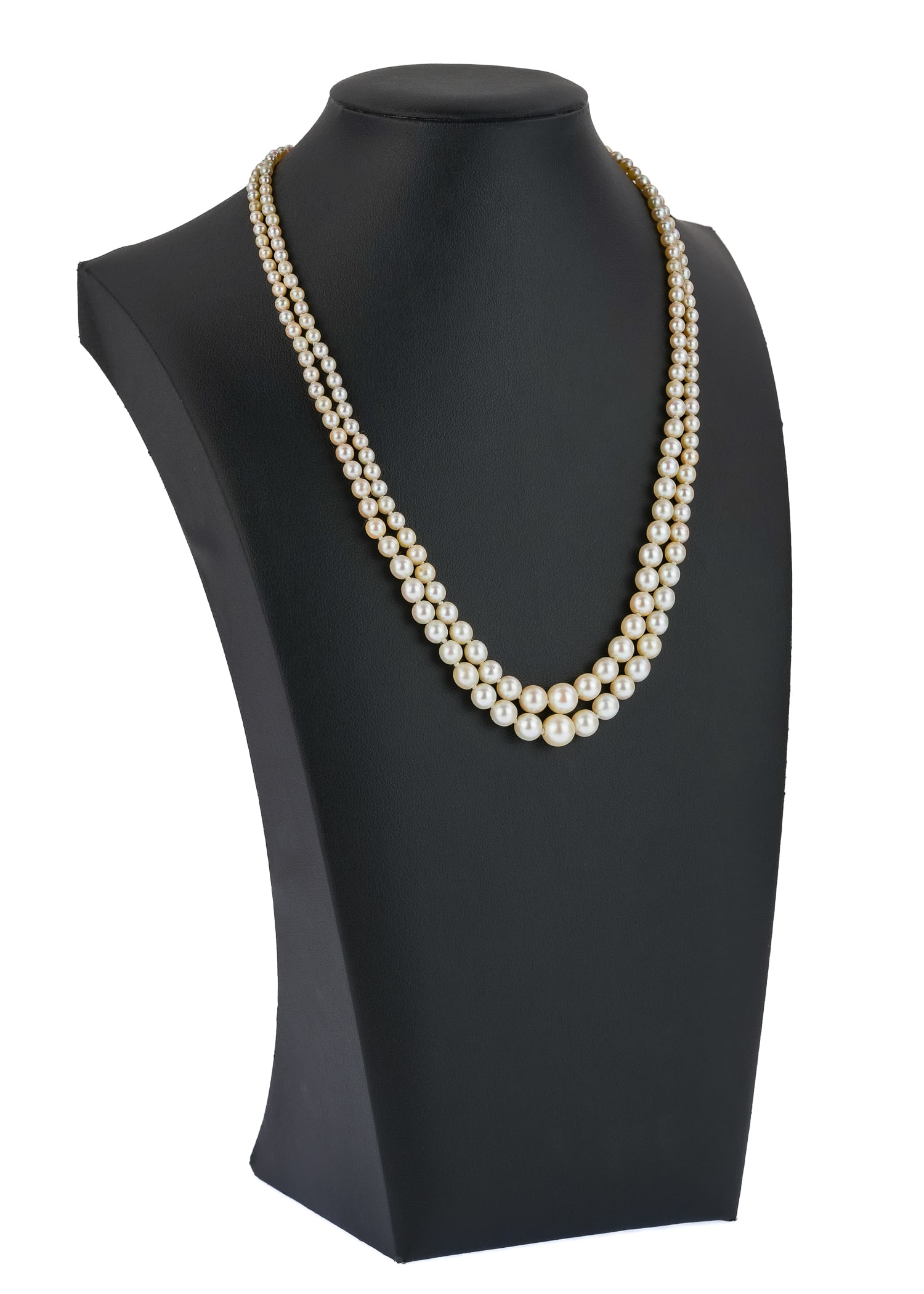 Antique Platinum, Diamond, & Double Strand Pearl Necklace: A double strand of graduated pearls, 3 to 8 mm diameter & 17" long. With a platinum clasp having diamond center approx. .6 cts with a 30 rd cut diamond surround or approx. 1 CT.T.W. diamonds.