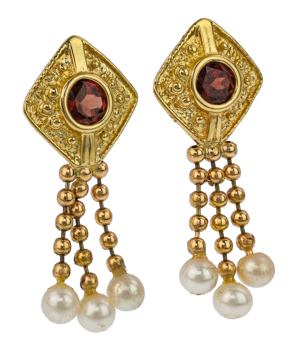 Garnet, Pearl, & Gold Earrings: A pair of 14k yellow gold earrings with center 1/2 CT round cut garnets and 3 - 4 mm pearls on each earring. 1 1/4" long.