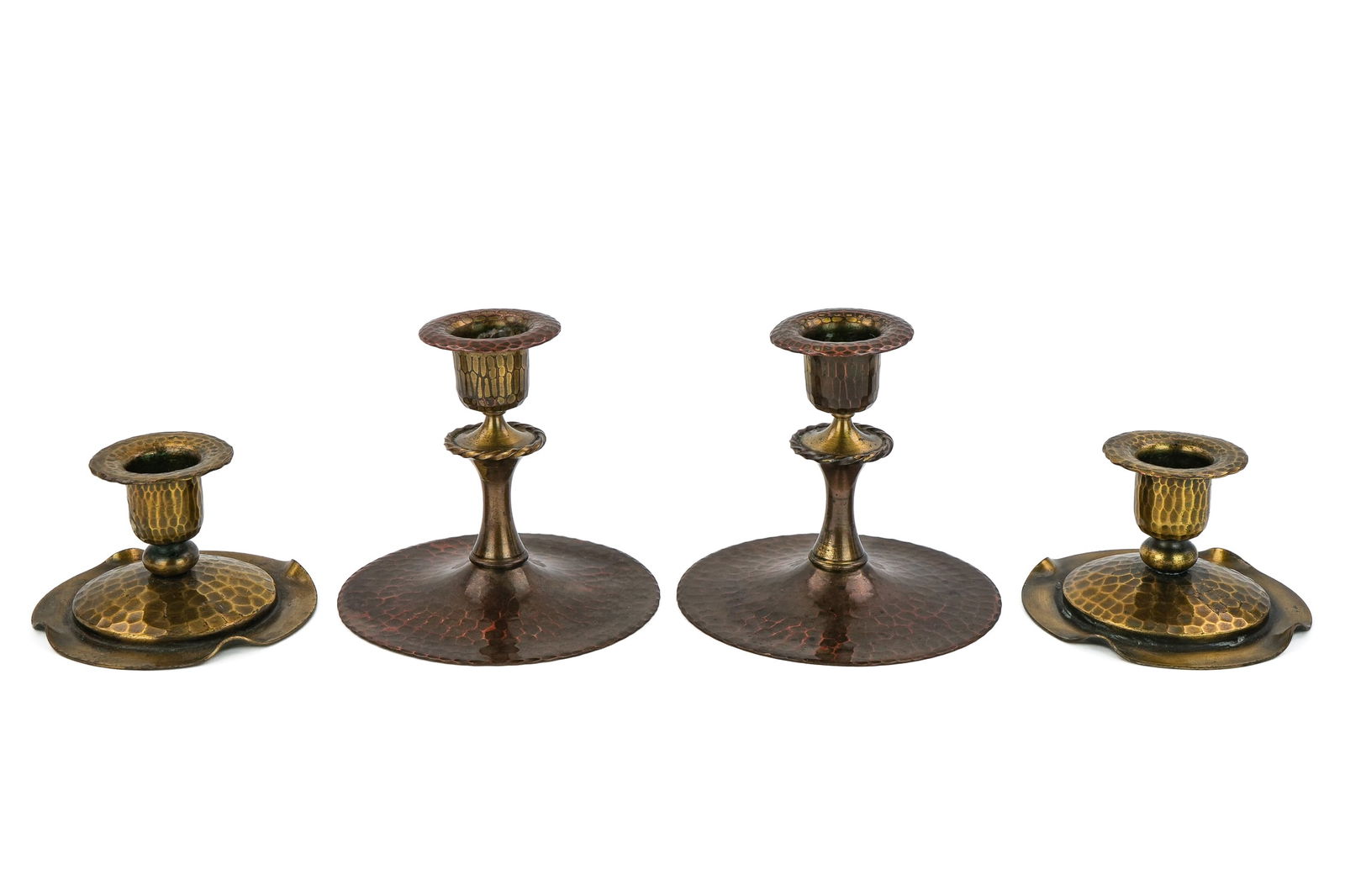Roycroft Hand Hammered Candlesticks: Two pair of Roycroft Arts & Crafts hand-hammered candlesticks, East Aurora, NY, mid Roycroft orb, Aurora, brass finishes, ht 3 1/2", base diameter 4" & ht 2", base diameter 3 1/2"