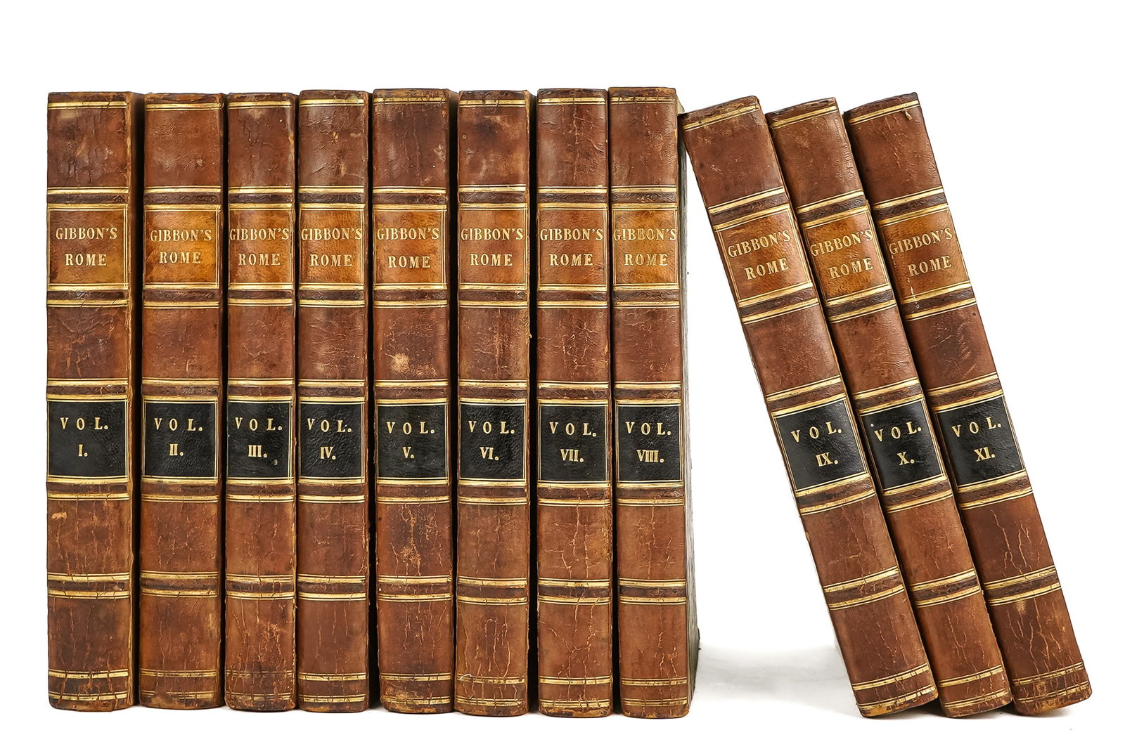 11 Volumes Gibbon's Rome Ca. 1820: 11 volumes, 1820 London, The History of the Decline and fall of the Roman Empire, by Edward Gibbon. Marbleized covers, gilt leather binders. 8 3/4" h, missing volume 12. Foxing, age worn.