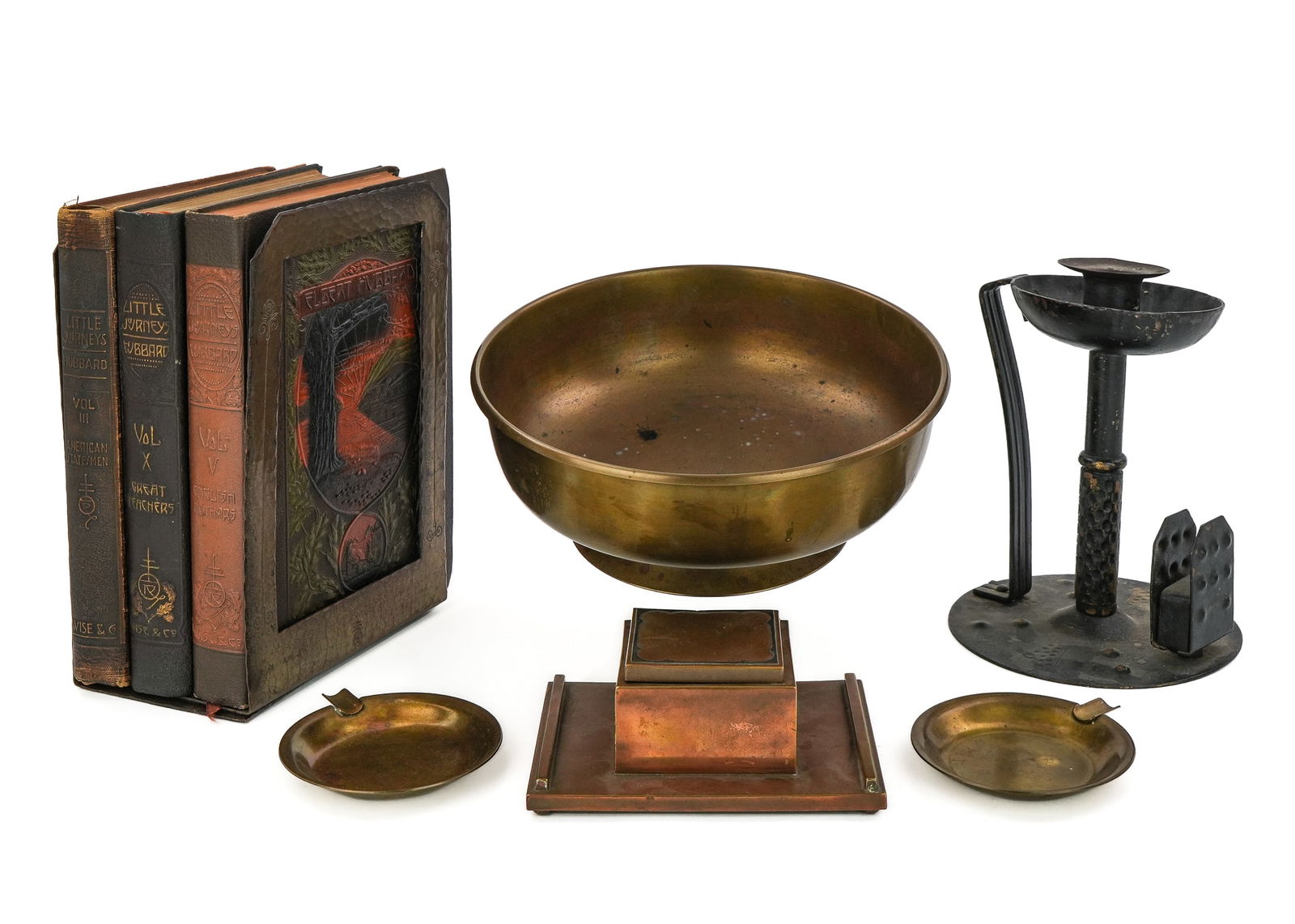 Roycroft Books, Bookends, Compote: Roycroft Arts & Crafts books, brass compote, copper bookends, brass ashtrays, Silvercrest bronze & sterling inkwell (no insert), and a German Arts & Crafts candlestick with match holder