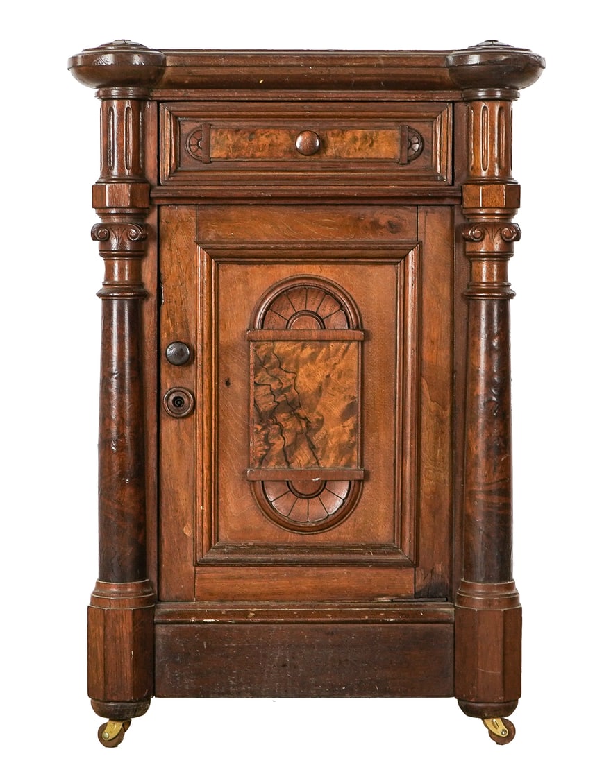 Victorian Granite Top Walnut Side Cabinet: Fine 19th c Victorian walnut and burl walnut side cabinet with inset pink & black granite top, corner columns with floral top rosettes, single drawer over single door with burl panels. On castors,