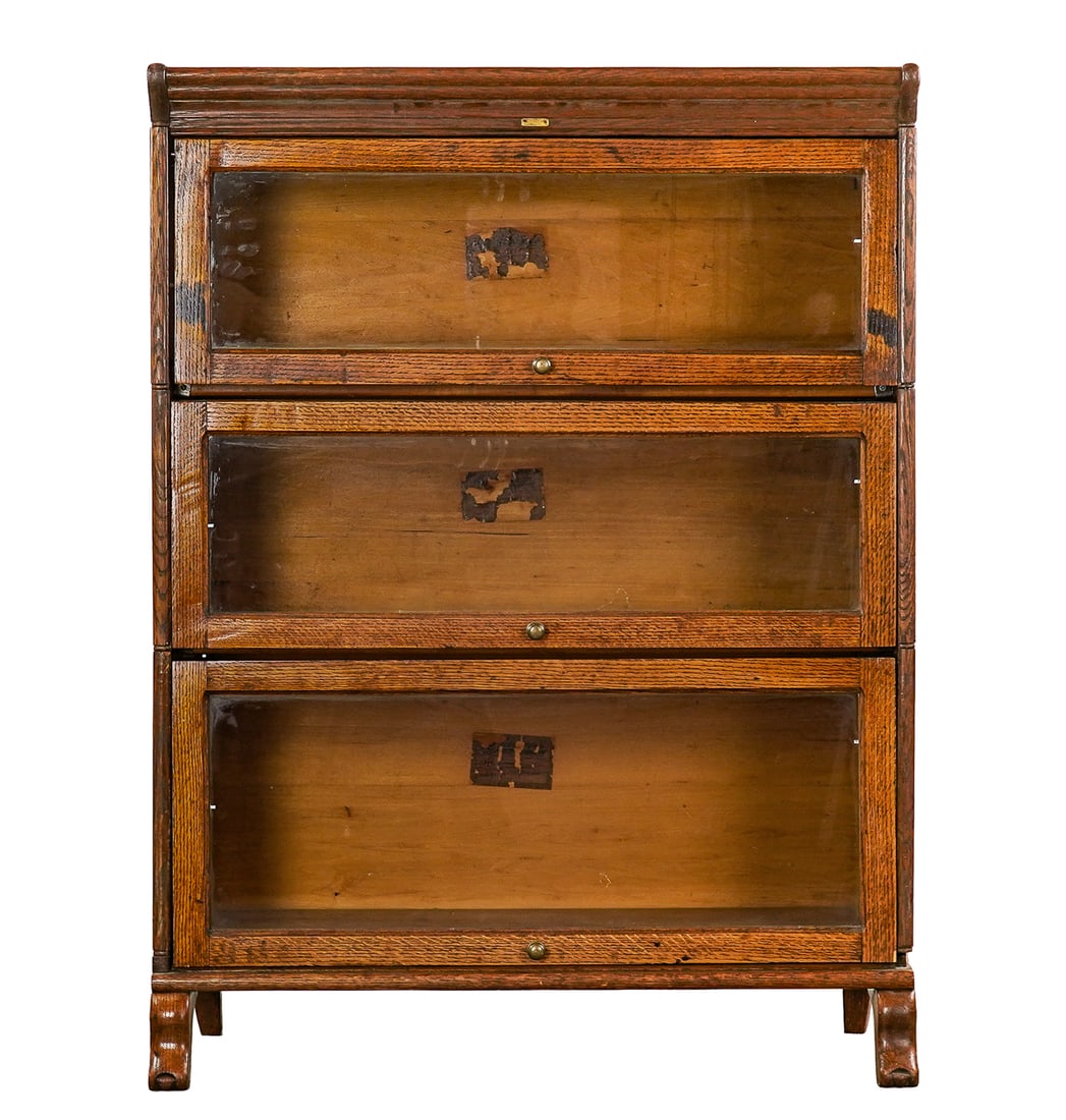 Lundstrom Oak 3 Section Bookcase: A ca. 1900 Lundstrom oak 3 section bookcase. 33" wide. One 14" wide door, 2 11" wide doors. Complete, good condition, disassembled.