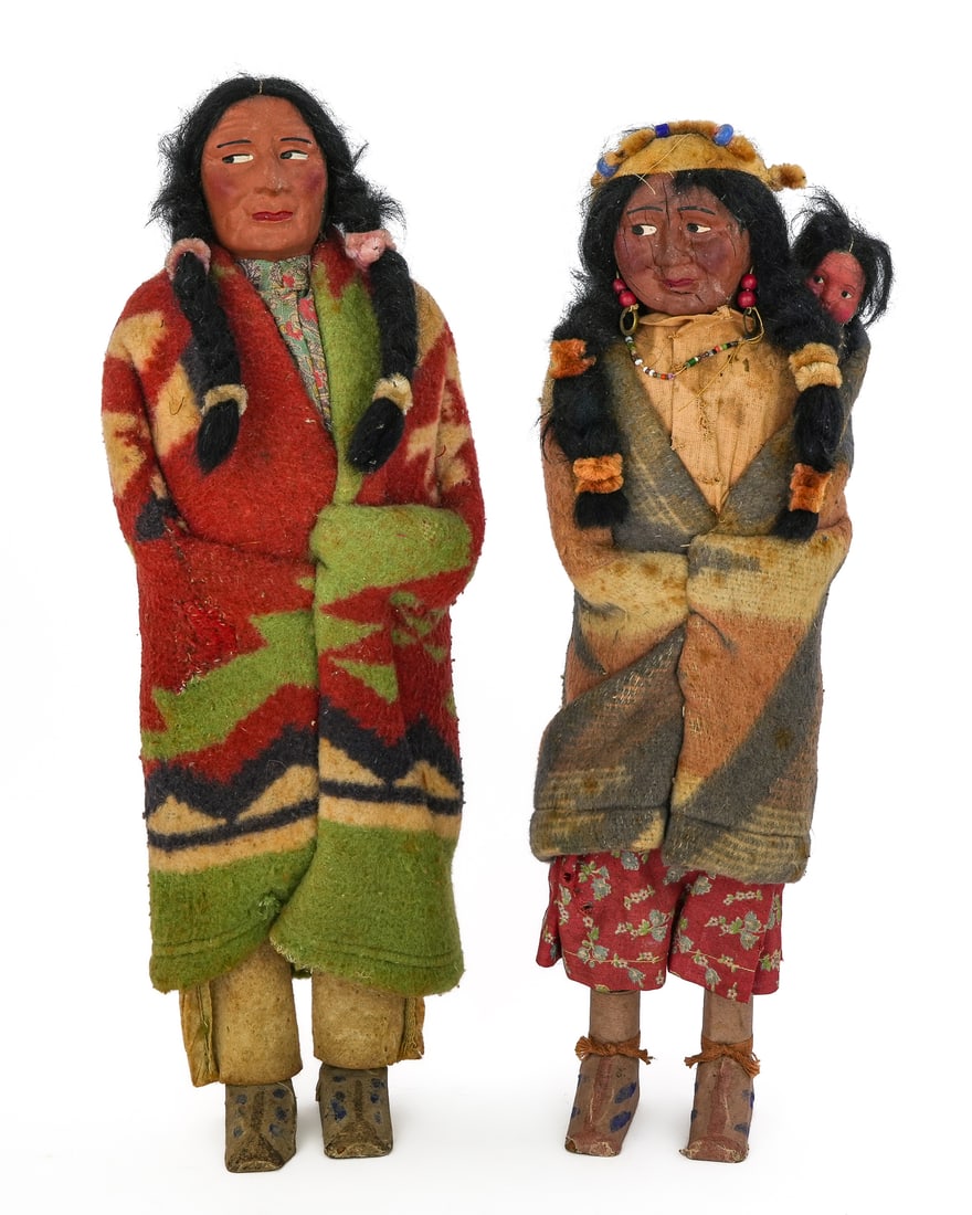 Native American Skookum Indian Dolls: Pair of Native American "Skookum" Indian dolls, both with original labels on feet, hts 16", 15 1/2"