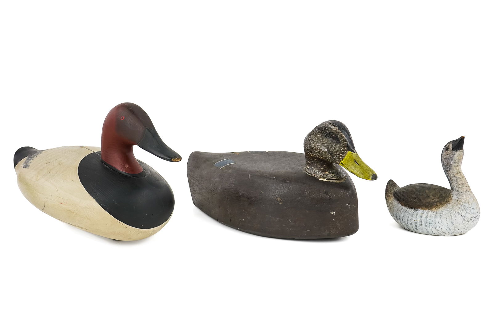 Butch Parker, Two Other Decoys: Canvasback Duck Decoy, attributed to Butch Parker, Holtwood, Pennsylvania, late 20th century, with painted eyes, weighted base branded "PARKER, length 16", sold with an unsigned working bird and a
