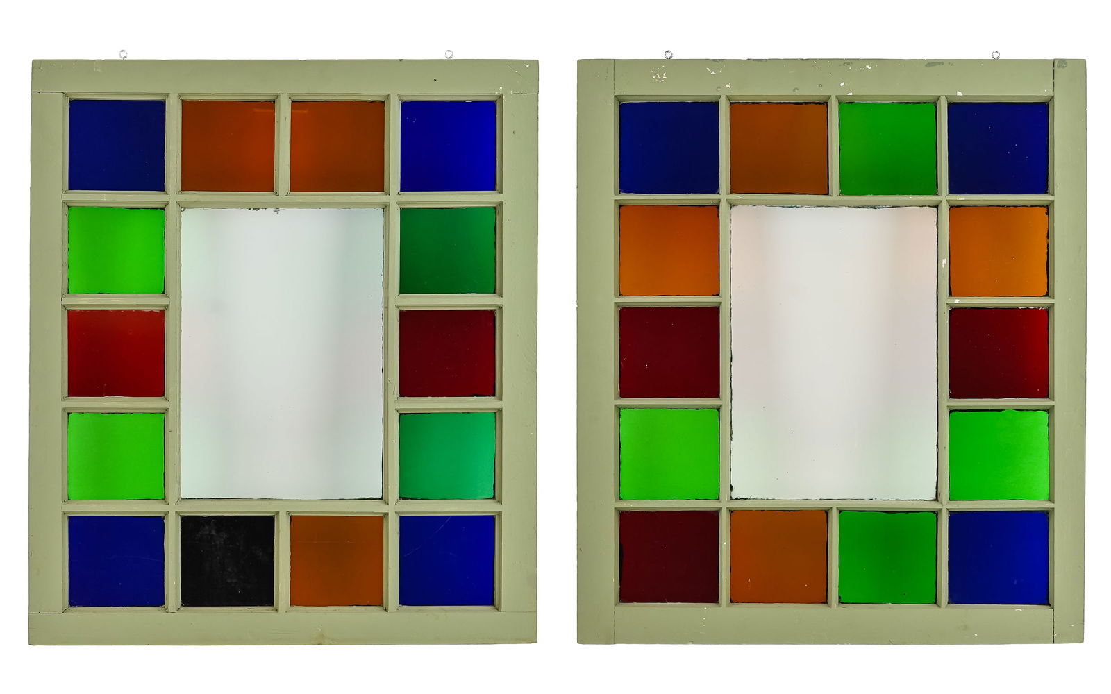 Pair of Colored Glass Window Sashes: Pair of ca 1900 wooden window sashes with colored glass panes, 32" x 28"