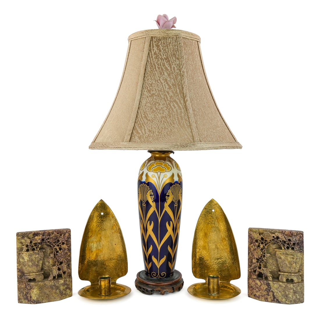 Decorative Lighting & Bookends: A pair of hammered brass 8" h candle sconces, a pair of 6" h carved soapstone Asian bookends, and a Doulton Burslem late 19th c gilt, cobalt, and floral motif vase / lamp. Damaged, 11" h vase, 24"