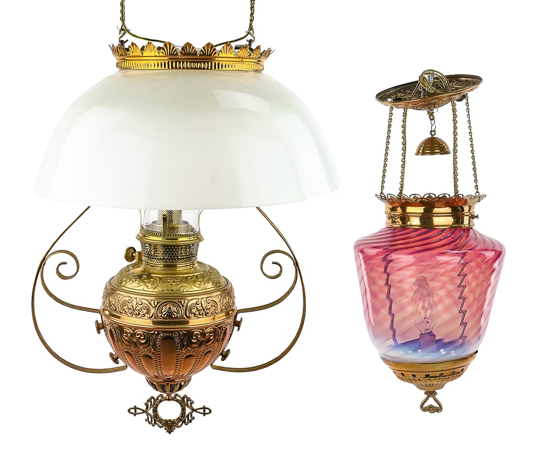 Two Victorian Era Brass Hanging Light Fixtures: Two Victorian era polished brass hanging light fixtures including Bradley and Hubbard hanging oil lamp with milk glass domed shade (electrified, but with burner intact), accompanied by a pendant hall