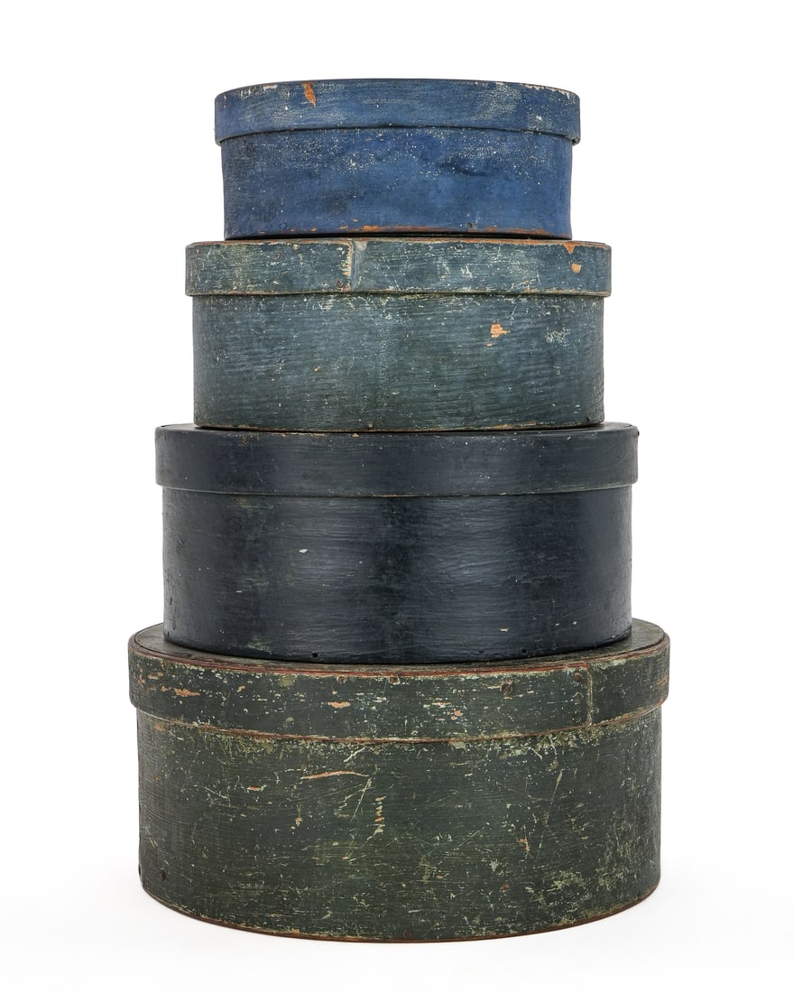 Stack of Four Pantry Boxes: Stack of 4 round pantry boxes in old paint, including blue, 6" x 6" x 2 1/2", 7 1/2" x 7 1/2" x 3", 8 1/2" x 8 1/2" x 3", 9 1/2" x 9 1/2" x 4 1/2"