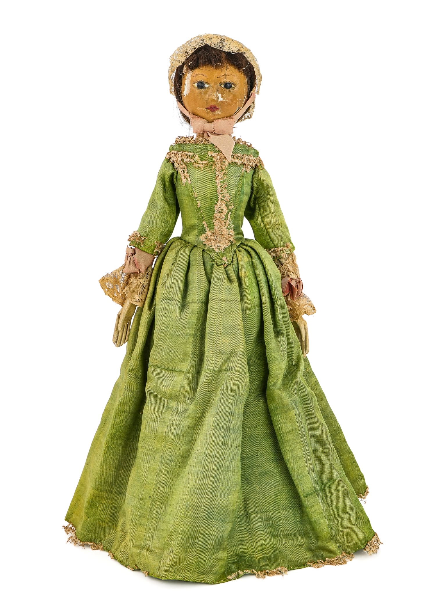 18th c Queen Anne Wooden Doll: 18th c "Queen Anne" doll, one piece carved wood head and torso, inset dark eyes, human hair wig, face repainted, flaking, wooden hands and forarms, cloth upper arms and legs, dressed in antique