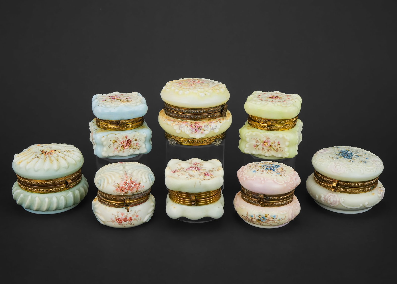8 Wavecrest Victorian Art Glass Dresser Boxes: Collection of eight late 19th c. C.F. Monroe Meriden, CT "Wavecrest" Victorian art glass dresser jars having handpainted floral enamel decoration on lids and brass frames, overall excellent condition
