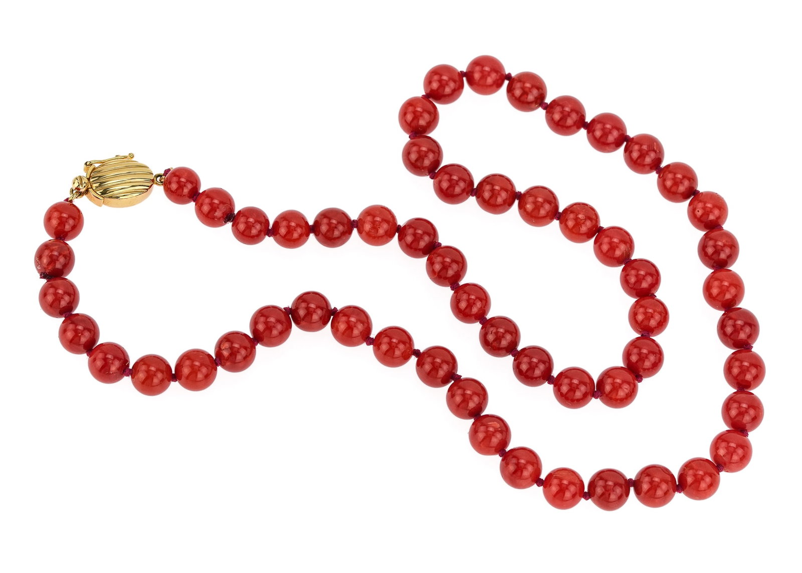 14k & Coral Bead Necklace: 14k yellow gold clasp with a 18" long strand of 7.5 mm red coral beads.