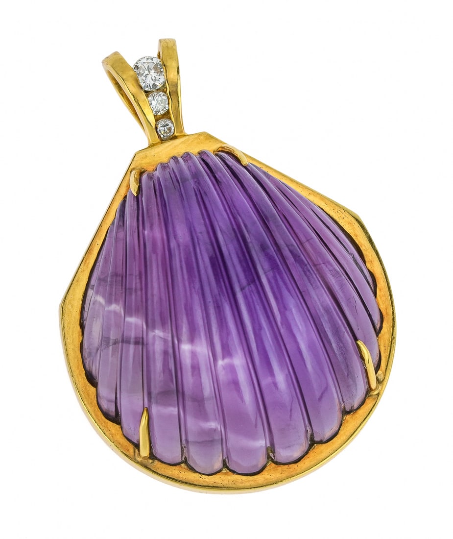 18k Shell Carved Amethyst & Diamond Pendant: 18k yellow gold set with a shell carved amethyst 30 mm x 28 mm, with channel set diamond bail having 3 .02 to .03 ct diamonds. 1 3/4" long.
