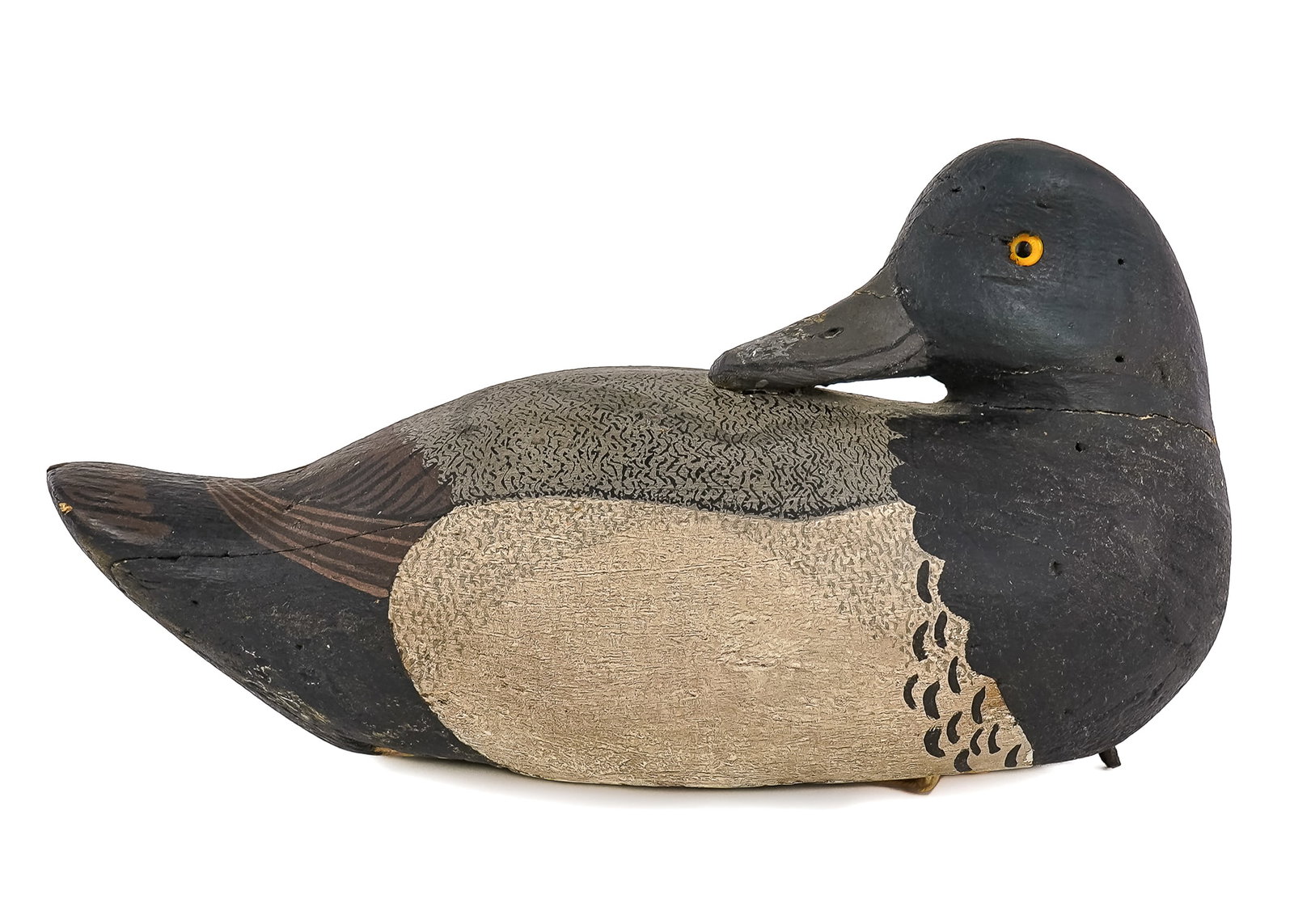 Preening Bluebill Drake Decoy: Early 20th c preening bluebill drake decoy. Original or old working repaint, working bird, butterfly weight, glass eyes, old note tag on bottom "Drake Great Scaup or Green Head? Factory". Paint