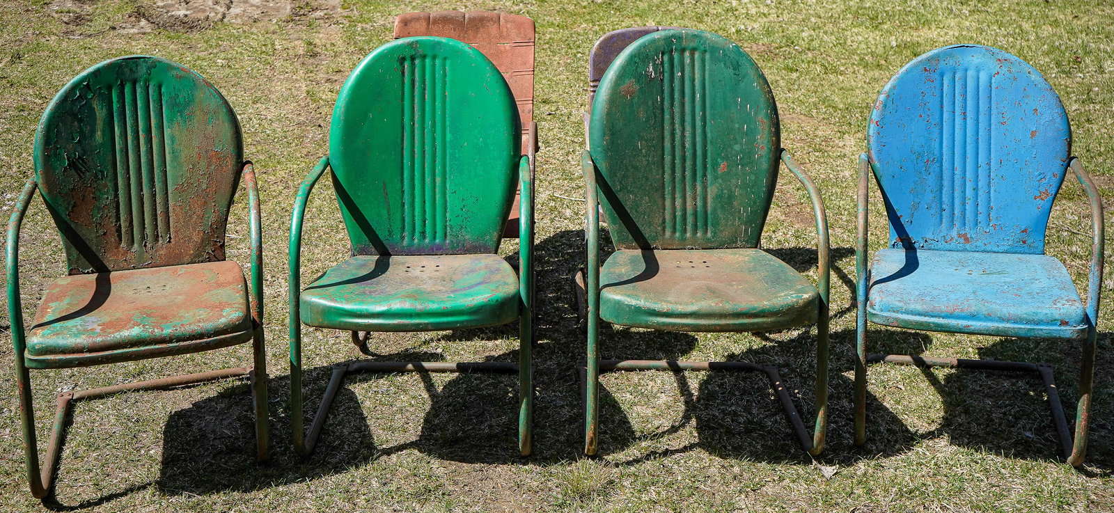 Six Spring Steel Motel Chairs: Six Spring Steel Motel Chairs- Four Very similar in construction, two others of different designs, in later paints. 37 x 26 x 21"