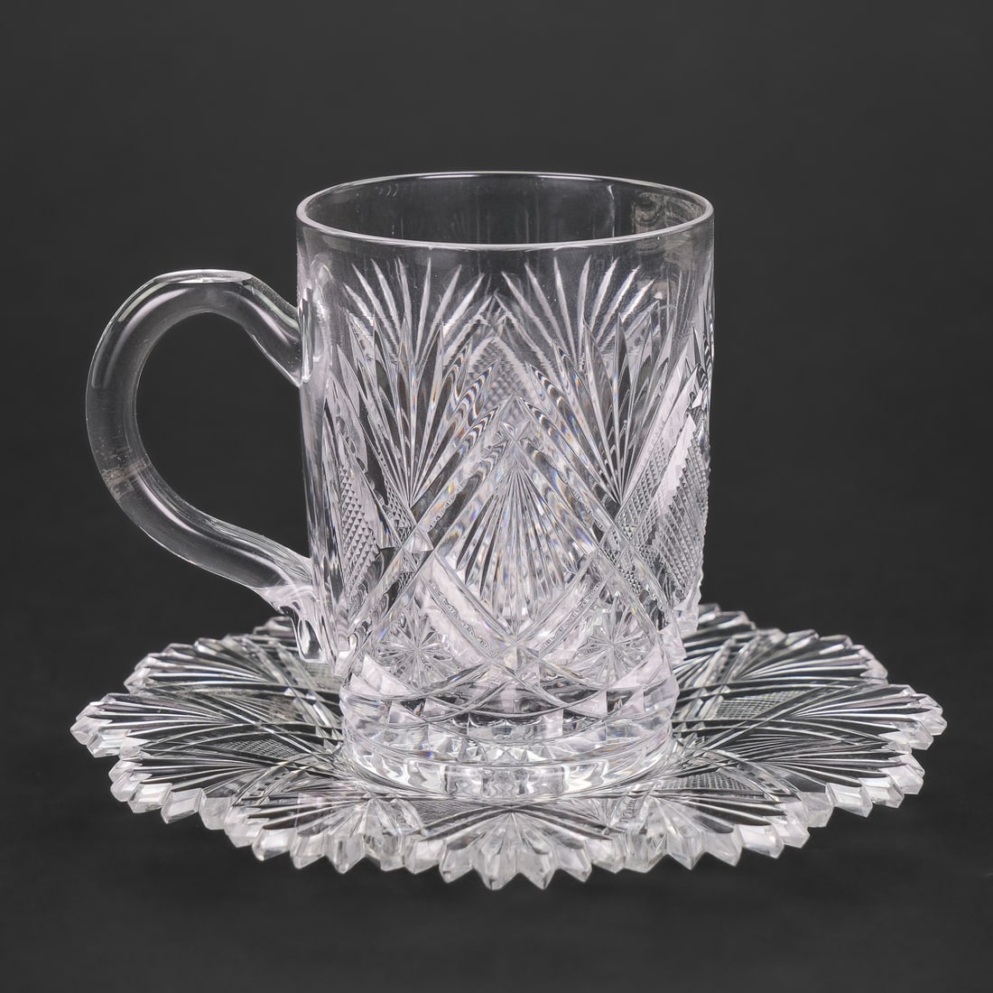 Dorflinger Parisian ABCG Cup and Saucer: Fine Dorflinger "Parisian" pattern American Brilliant Period Cut Glass ABCG demitasse cup and saucer. Overall very good condition. For reference, see the Dorflinger Glass Museum Exhibition 2016