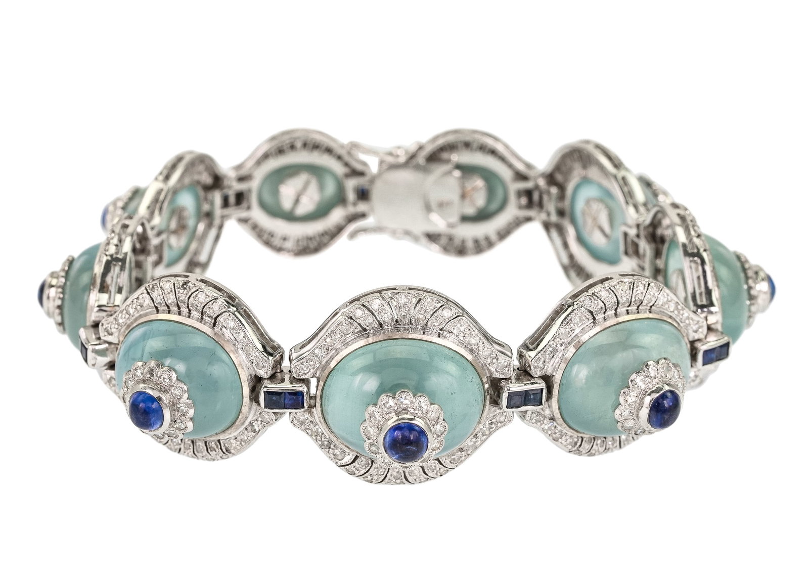18k 50 CT Aquamarine, Diamond & Sapphire Bracelet: 18k white gold bracelet with 9 graduated links each with cabochon aquamarine and a cake tier design having a cabochon sapphire top and multiple small diamond surrounds. Approx. 50 CT.t.w. aquamarines,