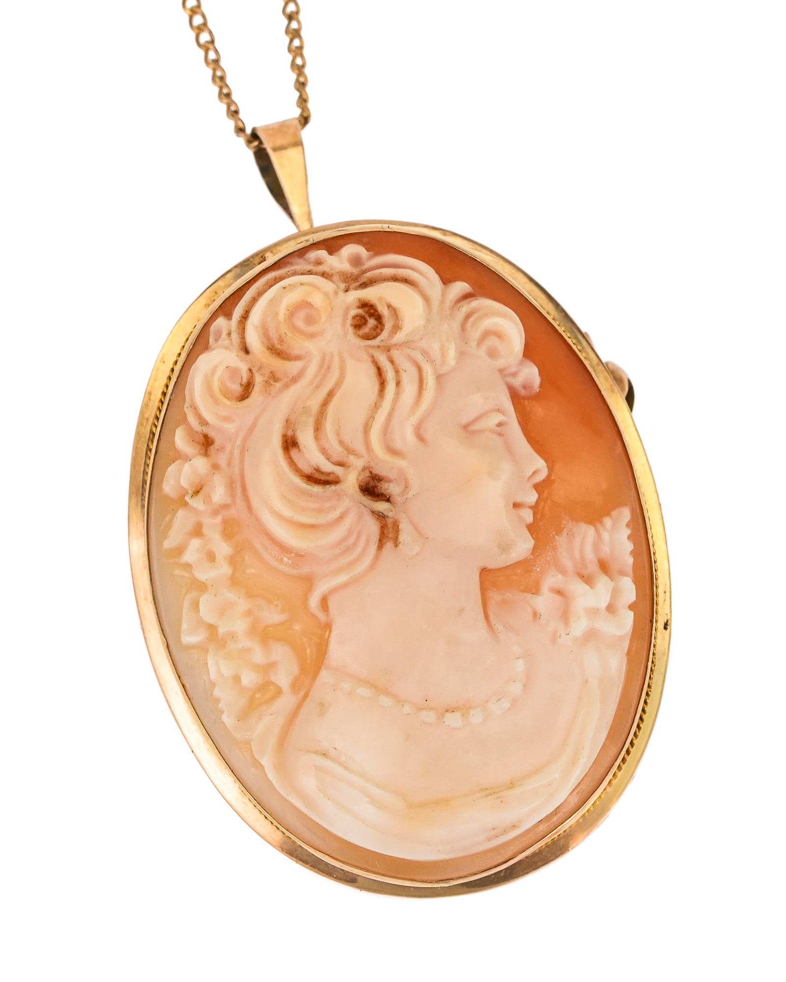 14k Cameo & Chain: 14k yellow gold framed Italian oval cameo brooch pendant, 1 1/2" long. On a 14k yellow gold chain.