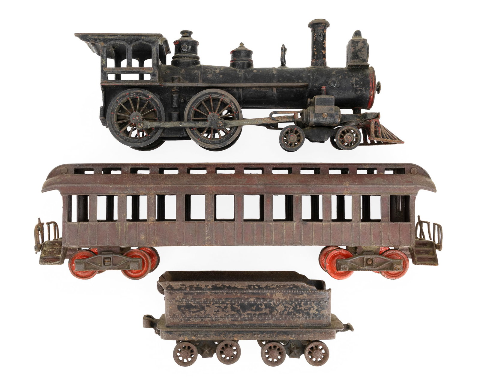 Large Wilkins Cast Iron Floor Train: Large Wilkins cast iron floor train engine with tender, engine length 13 1/2", tender 8 3/4", sold with a passenger car (not matching, but appropriate, bottom corner of one step missing), length 16"